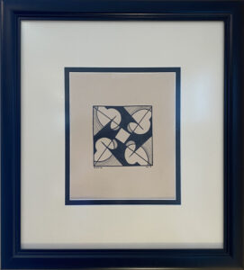 Abstract black shapes form a sort of pinwheel in a square frame.
