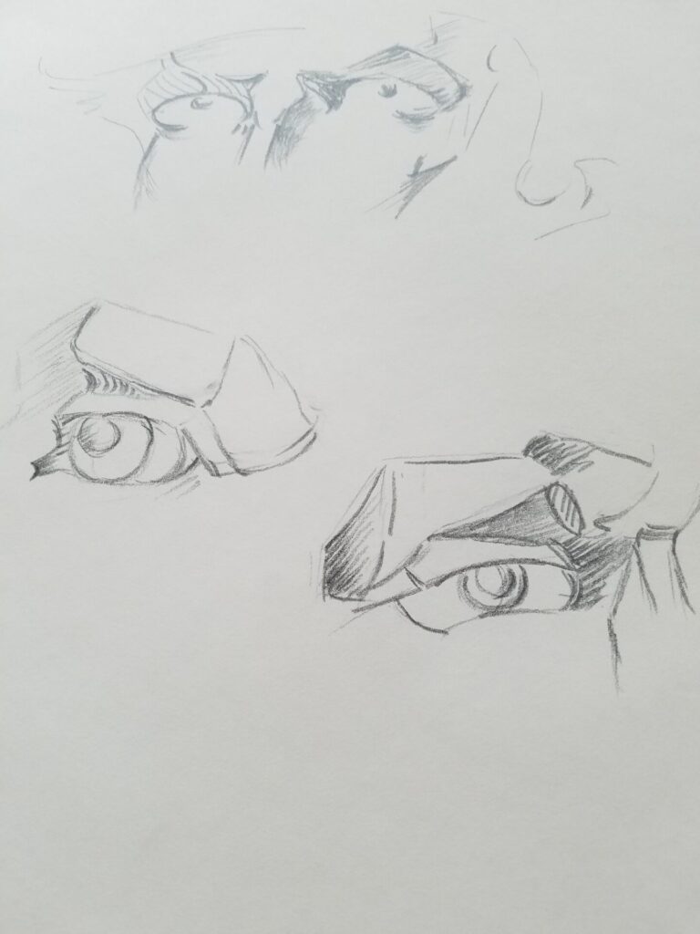 Sketch Diary 5 A page from sketch diary notebook with pencil drawing of a person's eyes and a couple of other eyes