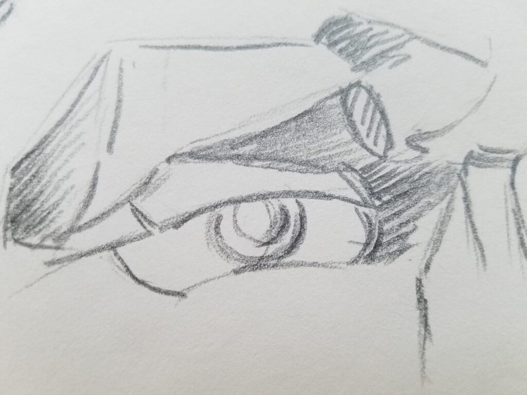 Sketch Diary 7 A page from sketch diary notebook with pencil drawing of a person's eye