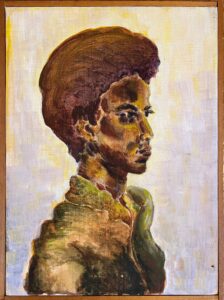 Portrait of a young man in three-quarters profile, painted in oils