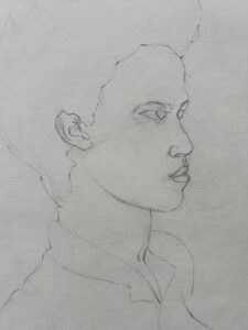 Pencil drawing of a boys head in profile.